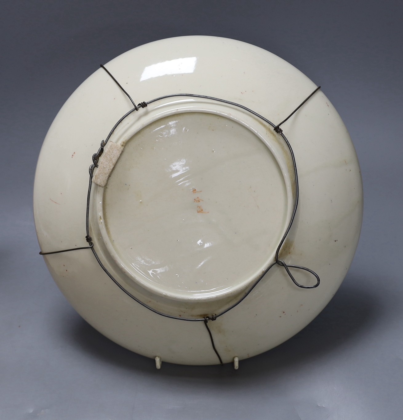 Two Japanese kutani chargers, signed, largest 36 cms diameter